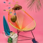 blue flip-flop beside chair