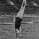 woman diving on the pool photograph
